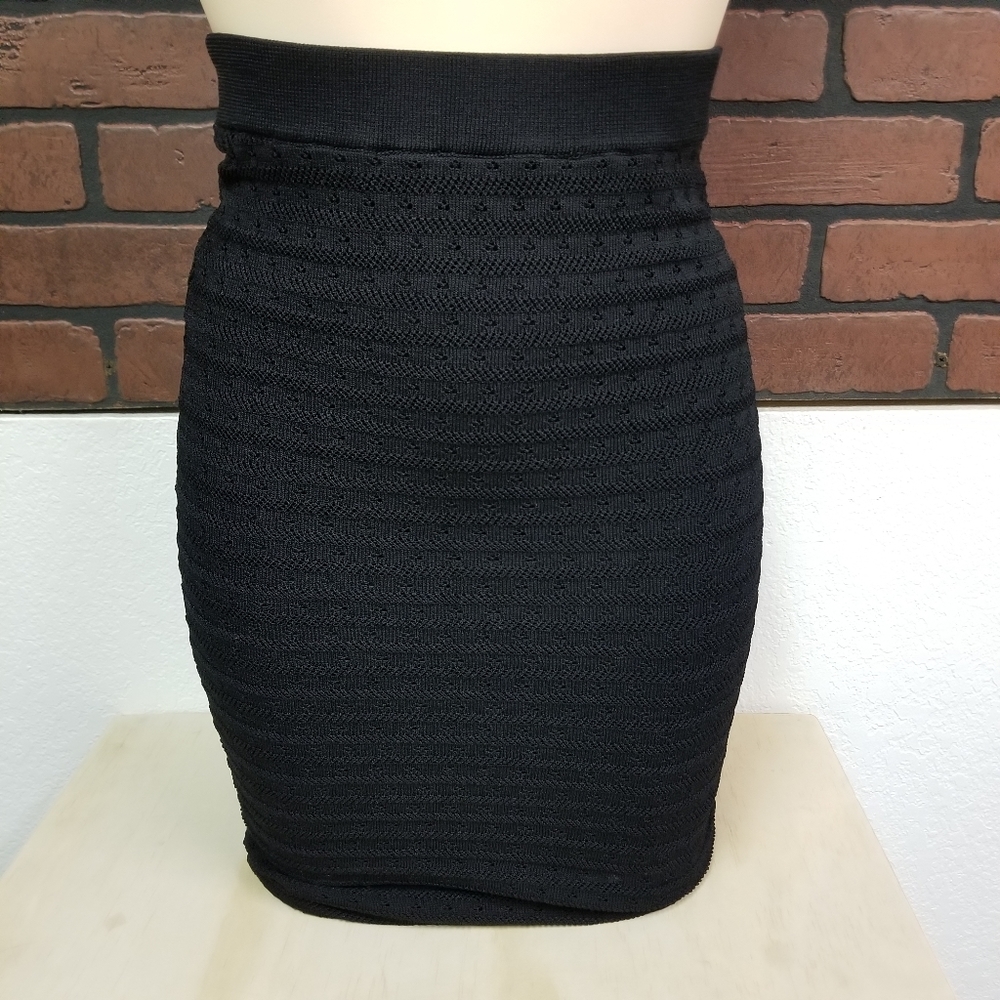 Bebe black pencil skirt in size small